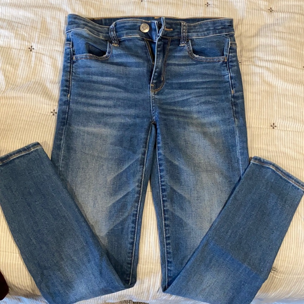 AE Next Level Stretch Jegging- medium wash size 4S
